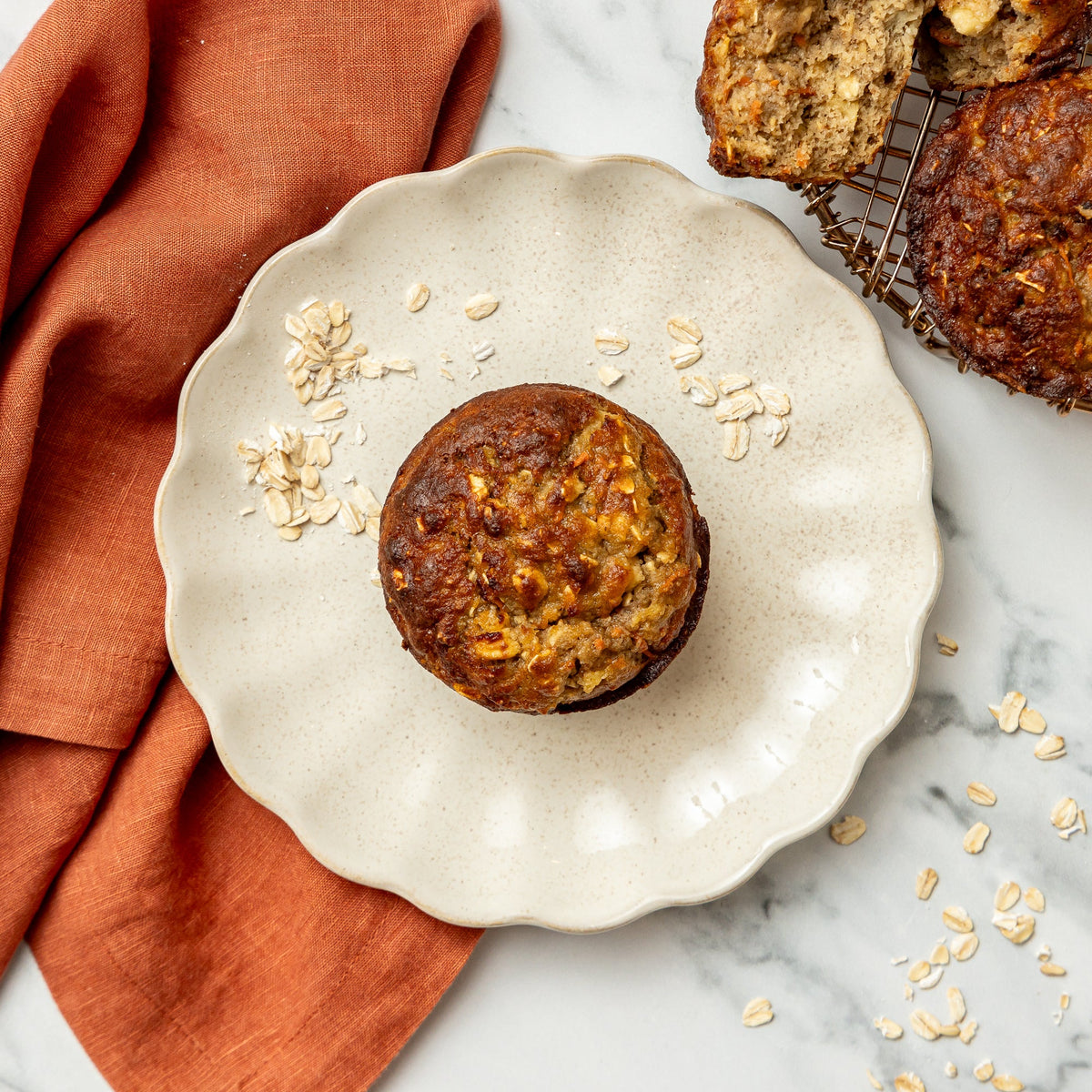 Spiced Oat Breakfast Muffin - Almond flour and gluten-free flour blended with carrots, pineapple, collagen peptides, and maple syrup