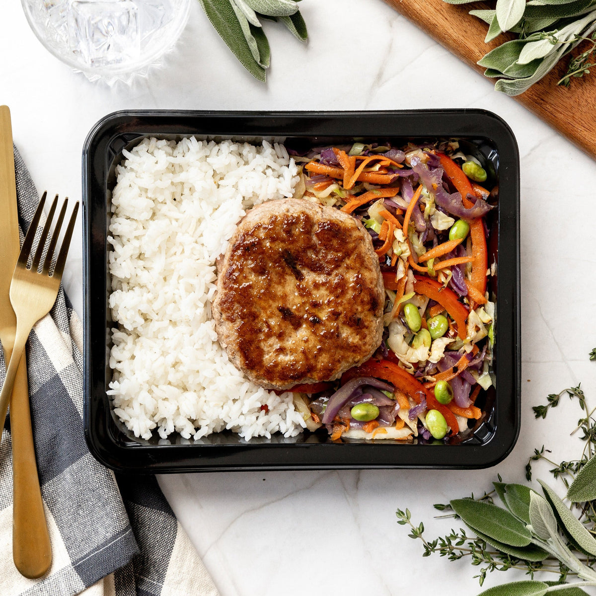 Asian Turkey Burger - Sweet and salty turkey burger with basmati rice and a vibrant veggie stir-fry tossed in ginger, garlic, and fit-flavors’ house Asian sauce