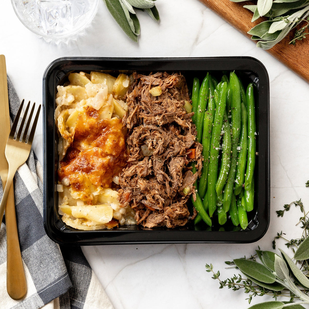 Braised Beef & Au Gratin Potatoes - Slow-braised beef in rich stock with herbs and veggies with cheesy au gratin potatoes and green beans