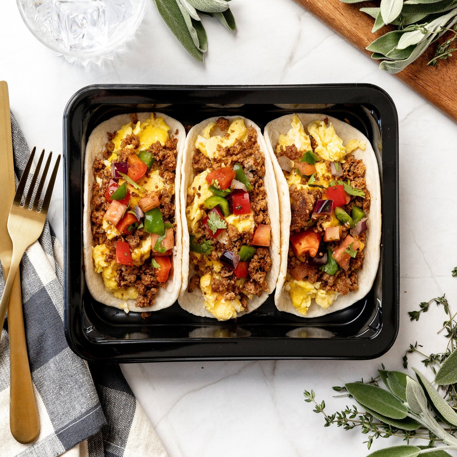 Breakfast Tacos - Flour tortillas, chorizo ground turkey, pasture raised scrambled eggs, pico de gallo