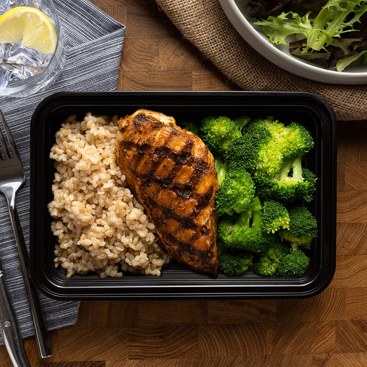 Chicken, Broccoli, & Rice - Chicken breast marinated in a peanut marinade, paired with tender broccoli and hearty brown rice