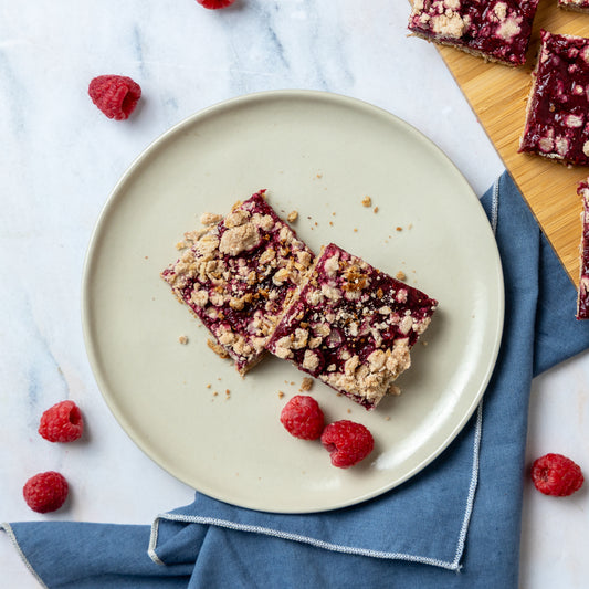 Raspberry Crumble Bars - Oats, plant based protein powder, monk fruit, brown sugar, coconut oil, raspberries