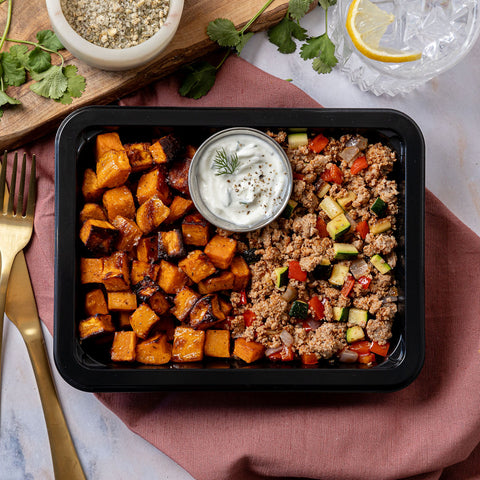 Turkey & Tzatziki Sauce - Ground turkey, zucchini, red bell pepper, fresh herbs, and sweet potatoes, with a side of tzatziki sauce