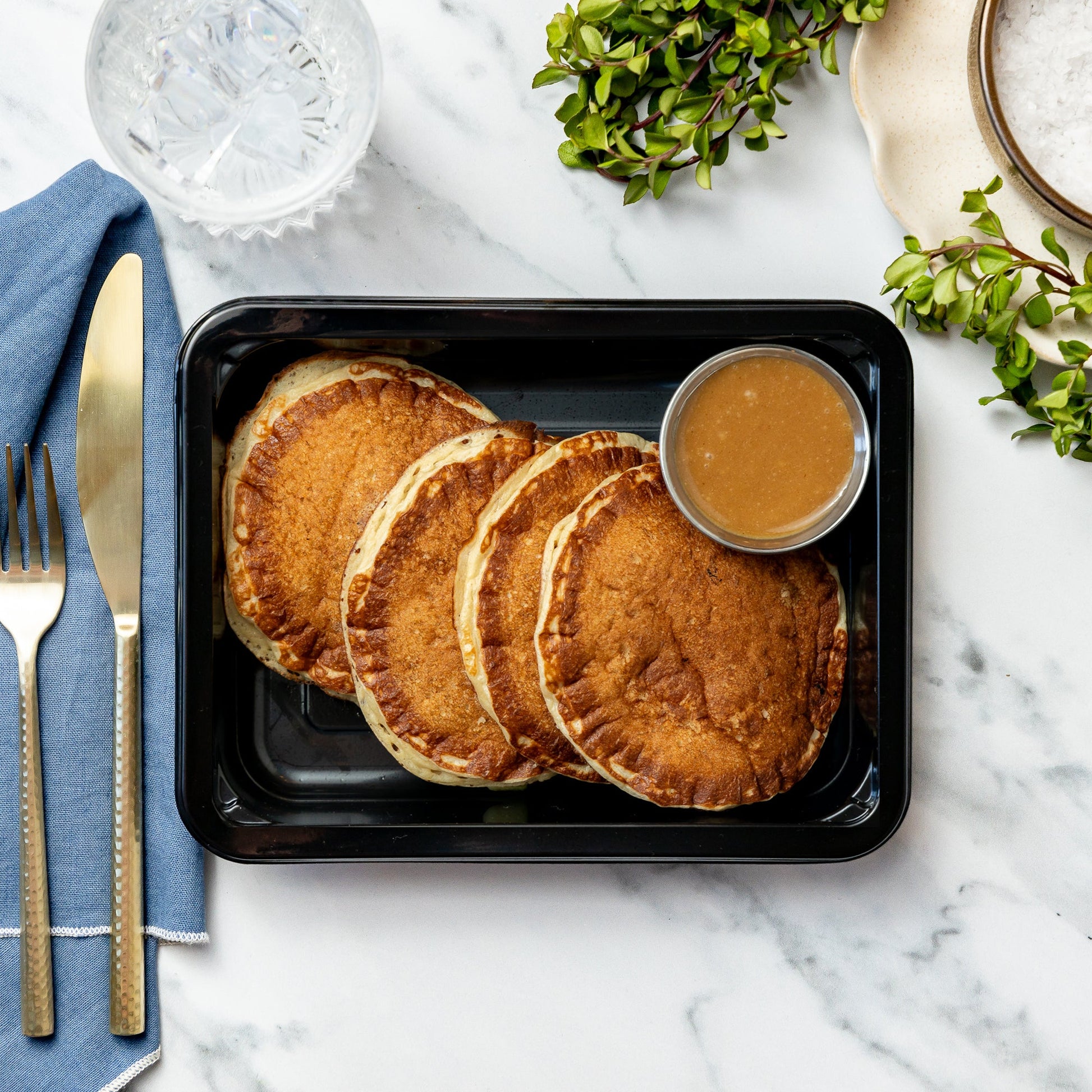 Peanut Butter Pancakes - Gluten free flour, pasture-raised eggs, Greek yogurt, vanilla, side of maple peanut butter sauce