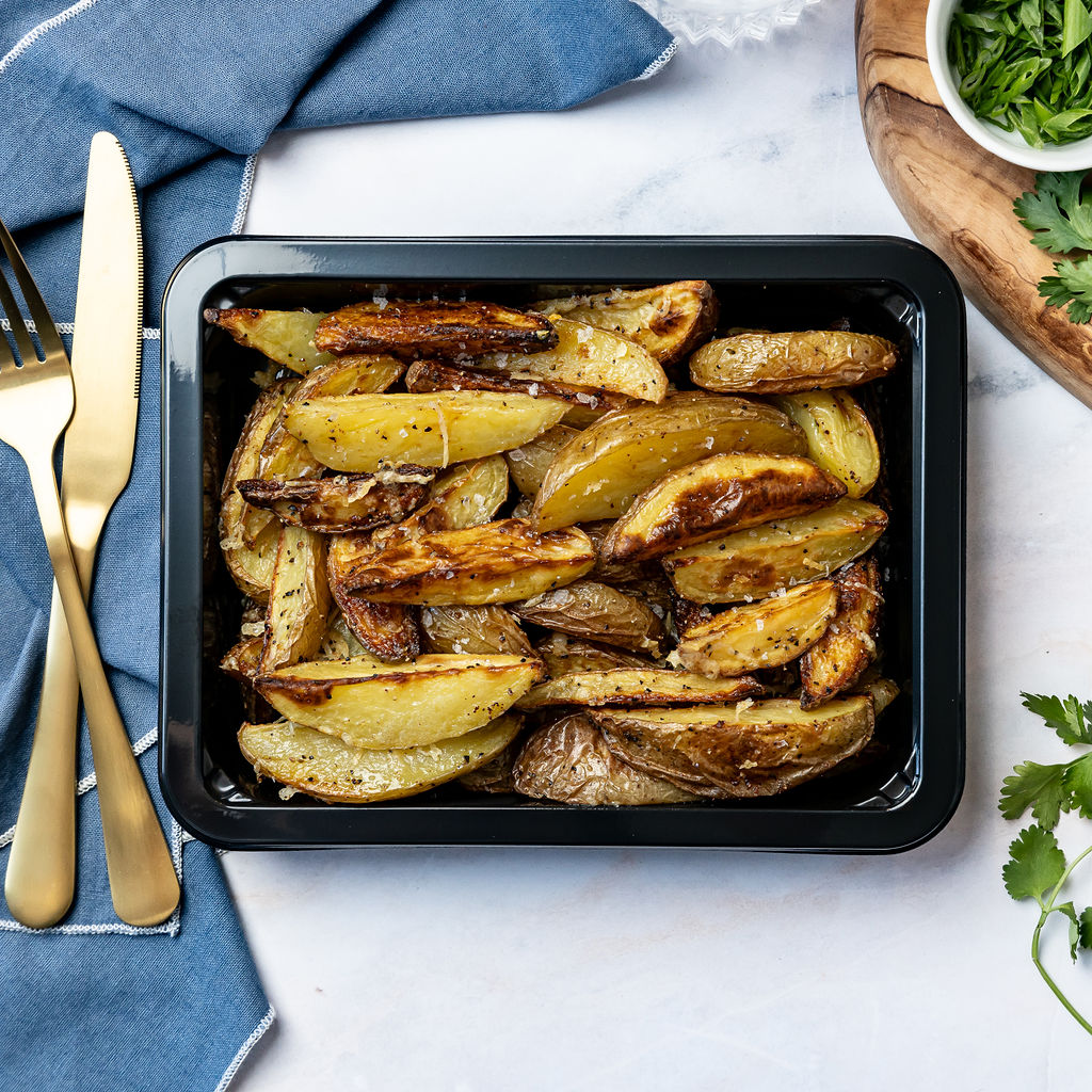 Bulk Parmesan Yukon Wedges - Roasted Yukon potatoes with parmesan cheese & garlic