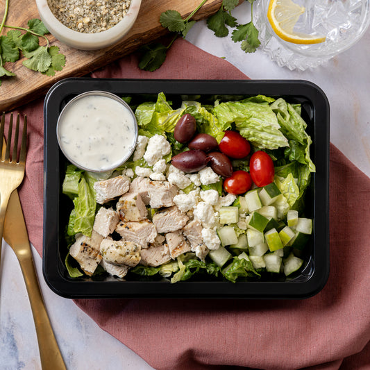 Greek Salad - Romaine lettuce, herb grilled chicken, grape tomatoes, cucumbers, Kalamata olives, feta cheese, with creamy Italian dressing